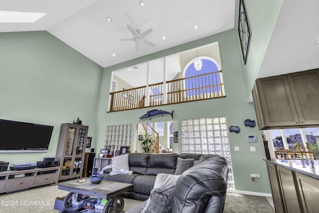 1030 Montauk Dr, Forked River, NJ 08731 - living area featuring high vaulted ceiling, ceiling fan, a skylight, light carpet, and recessed lighting