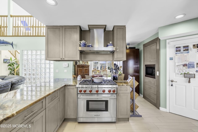 1030 Montauk Dr, Forked River, NJ 08731 - kitchen with stainless steel appliances, wall chimney range hood, a peninsula, light stone counters, and recessed lighting