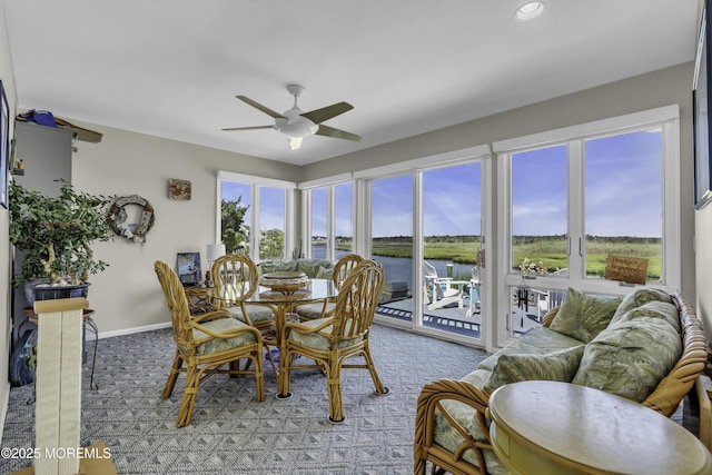 1030 Montauk Dr, Forked River, NJ 08731 - dining area featuring light colored carpet, a water view, ceiling fan, and recessed lighting
