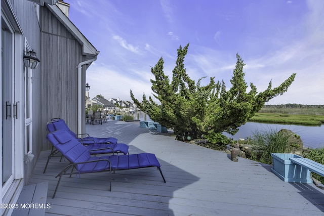 1030 Montauk Dr, Forked River, NJ 08731 - wooden deck with a water view
