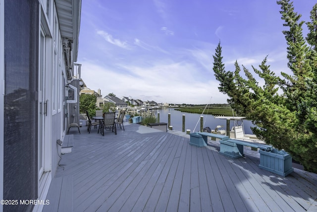 1030 Montauk Dr, Forked River, NJ 08731 - wooden deck featuring a water view, a dock, and outdoor dining space