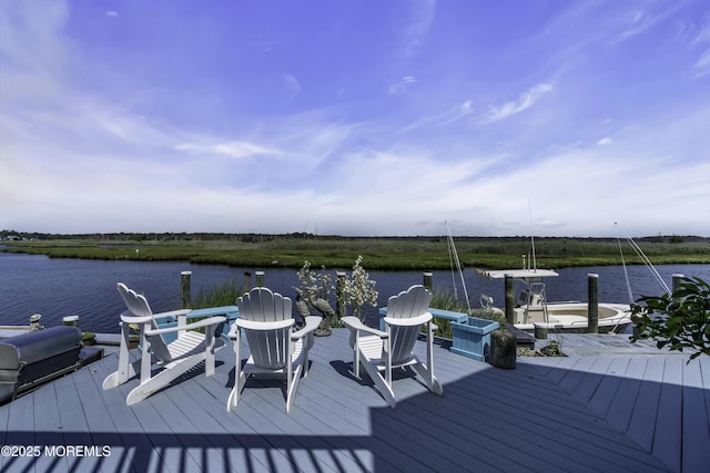 1030 Montauk Dr, Forked River, NJ 08731 - wooden deck with a water view, a boat dock, and grilling area