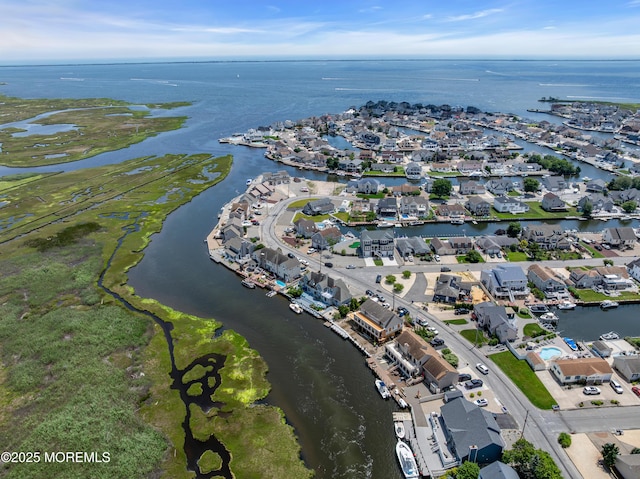 1030 Montauk Dr, Forked River, NJ 08731 - aerial view of property and surrounding area featuring a large body of water and nearby suburban area