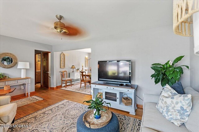 3100 Harrison St, Wall, NJ 07719 - living room featuring wood finished floors and ceiling fan