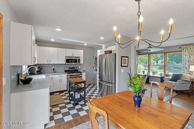 3100 Harrison St, Wall, NJ 07719 - dining area with recessed lighting and dark flooring