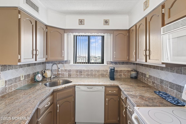 51 Hiering Ave Unit D9, Seaside Heights, NJ 08751 - kitchen featuring white appliances, decorative backsplash, crown molding, light stone counters, and a textured ceiling