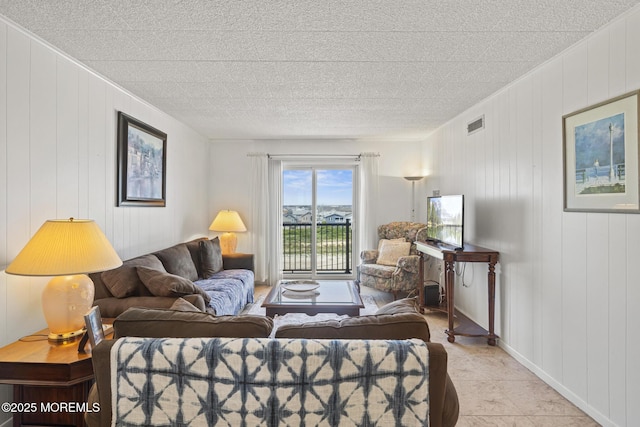 51 Hiering Ave Unit D9, Seaside Heights, NJ 08751 - living area featuring light tile patterned flooring and ornamental molding