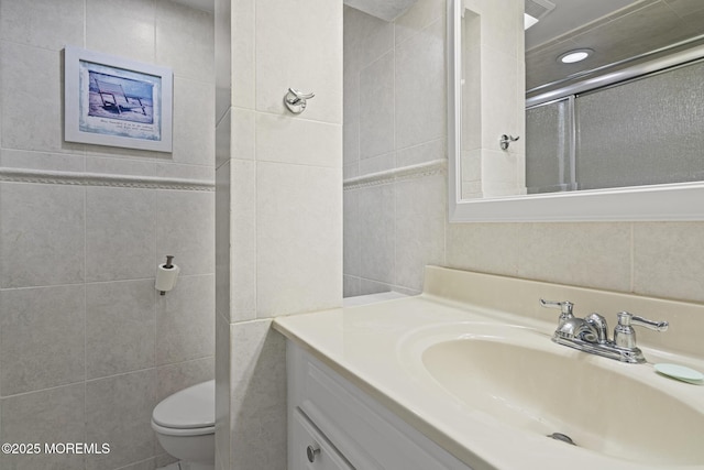 51 Hiering Ave Unit D9, Seaside Heights, NJ 08751 - bathroom featuring tile walls, vanity, and an enclosed shower