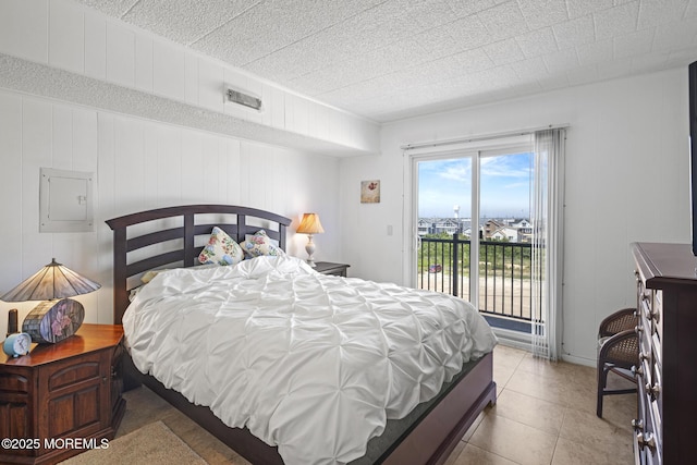 51 Hiering Ave Unit D9, Seaside Heights, NJ 08751 - bedroom featuring access to exterior, electric panel, and tile patterned floors