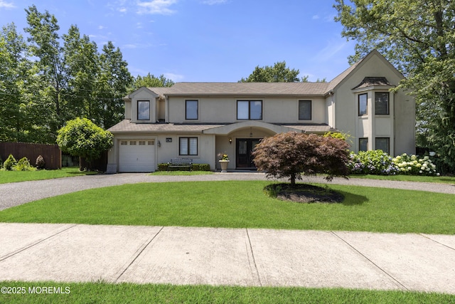 136 Sunset Rd, Lakewood, NJ 08701 - view of front facade featuring curved driveway, stucco siding, and a front lawn