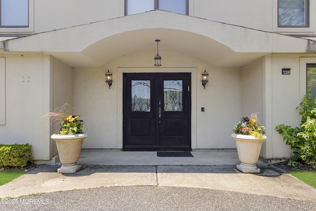 136 Sunset Rd, Lakewood, NJ 08701 - doorway to property featuring french doors and stucco siding
