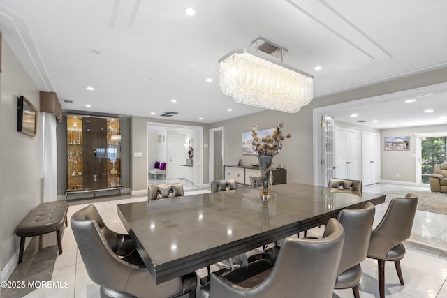 136 Sunset Rd, Lakewood, NJ 08701 - dining space with a chandelier, light tile patterned flooring, and recessed lighting