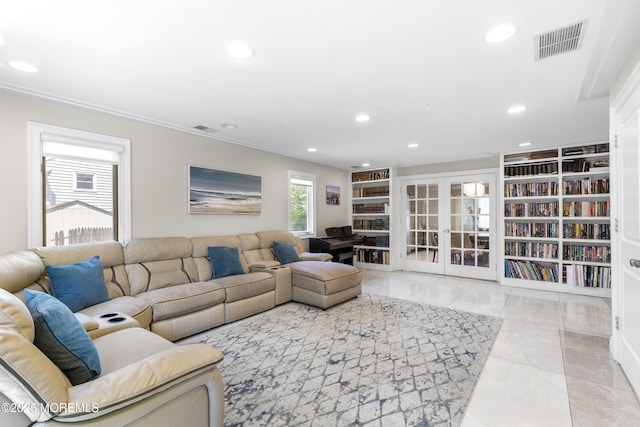 136 Sunset Rd, Lakewood, NJ 08701 - living room with recessed lighting, crown molding, and french doors