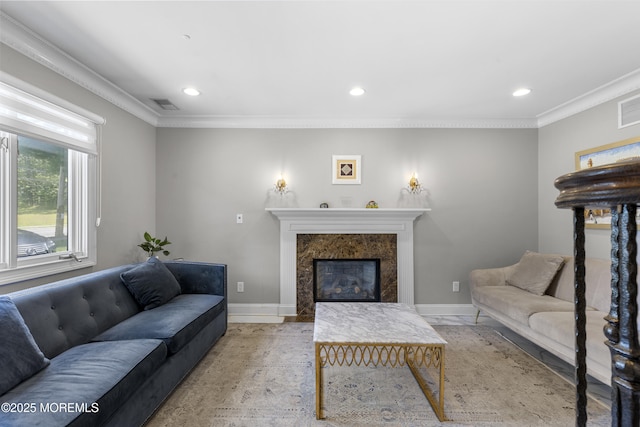 136 Sunset Rd, Lakewood, NJ 08701 - living room featuring ornamental molding, recessed lighting, and a fireplace