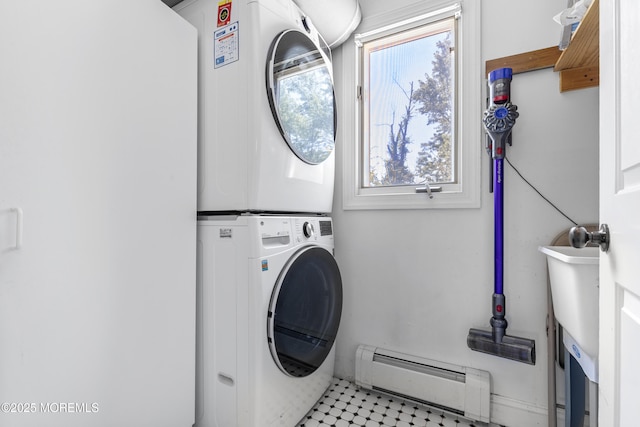 136 Sunset Rd, Lakewood, NJ 08701 - laundry room featuring estacked washer and dryer and a baseboard heating unit