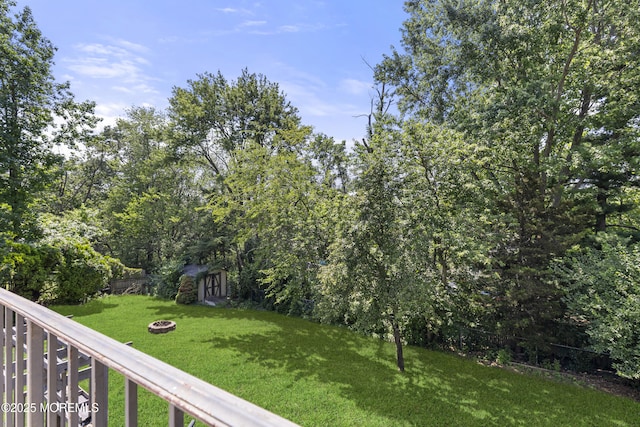 136 Sunset Rd, Lakewood, NJ 08701 - view of yard with an outdoor fire pit