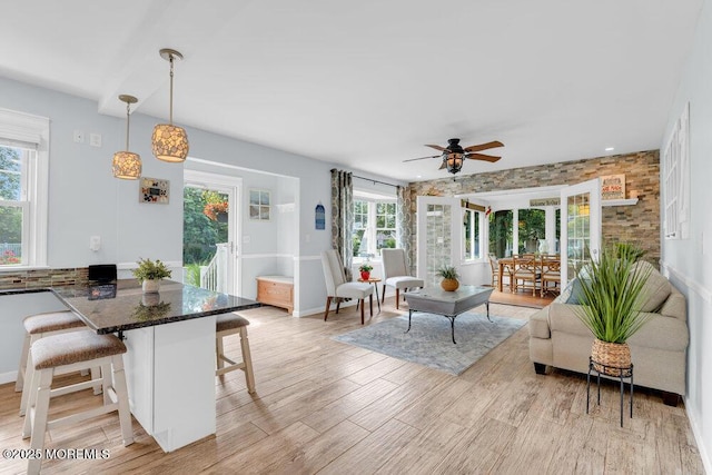 1 Cedar Ave, Rumson, NJ 07760 - living room featuring a ceiling fan and light wood-type flooring