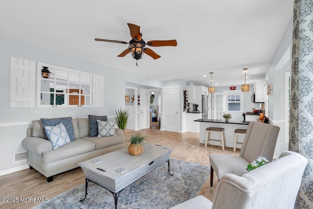 1 Cedar Ave, Rumson, NJ 07760 - living area featuring ceiling fan and light wood finished floors