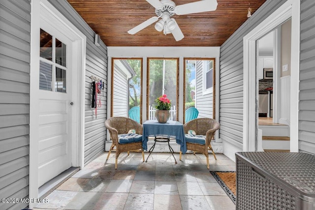 1 Cedar Ave, Rumson, NJ 07760 - sunroom with a ceiling fan, wooden ceiling, and stone tile flooring