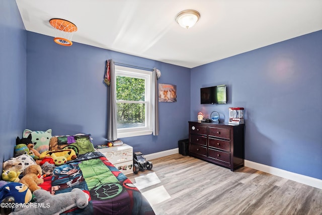 482 Radovan Ave, Bayville, NJ 08721 - bedroom featuring wood finished floors and baseboards