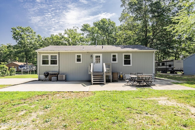 482 Radovan Ave, Bayville, NJ 08721 - rear view of property with a patio area, a yard, roof with shingles, and view of scattered trees