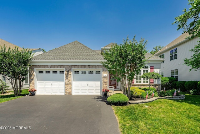 16 Gladstone St, Forked River, NJ 08731 - view of property hidden behind natural elements featuring a garage, asphalt driveway, a front lawn, and roof with shingles