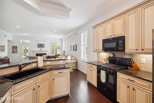 16 Gladstone St, Forked River, NJ 08731 - kitchen featuring black appliances, cream cabinetry, open floor plan, ornamental molding, and tasteful backsplash