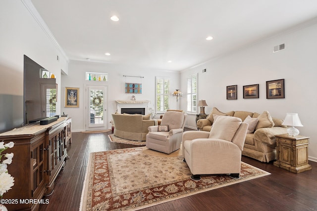 16 Gladstone St, Forked River, NJ 08731 - living room featuring crown molding, recessed lighting, dark wood-style floors, and a fireplace