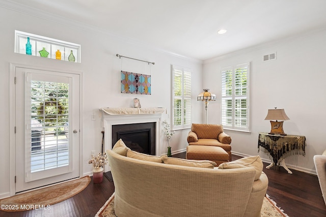 16 Gladstone St, Forked River, NJ 08731 - living area with crown molding, wood finished floors, a glass covered fireplace, and recessed lighting