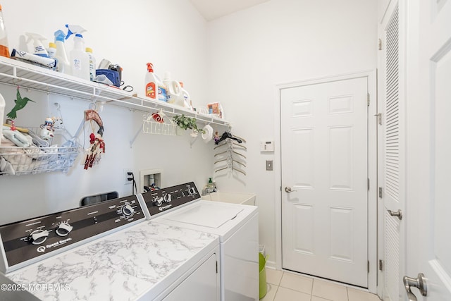 16 Gladstone St, Forked River, NJ 08731 - laundry area featuring washing machine and dryer and light tile patterned floors