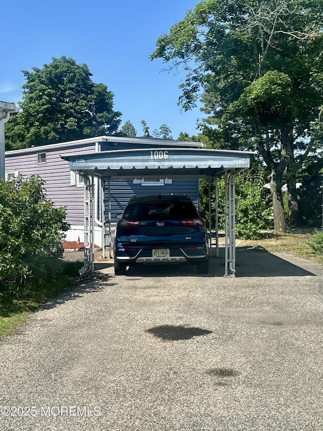 1006 Nocturn Way, Toms River, NJ 08755 - view of car parking with driveway and a detached carport