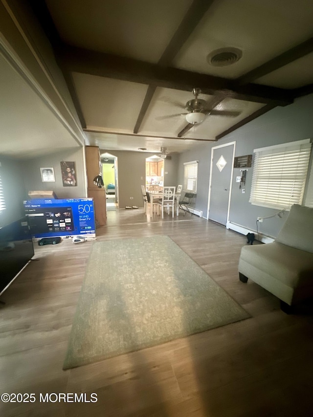 1006 Nocturn Way, Toms River, NJ 08755 - living area featuring a ceiling fan, wood finished floors, and beamed ceiling