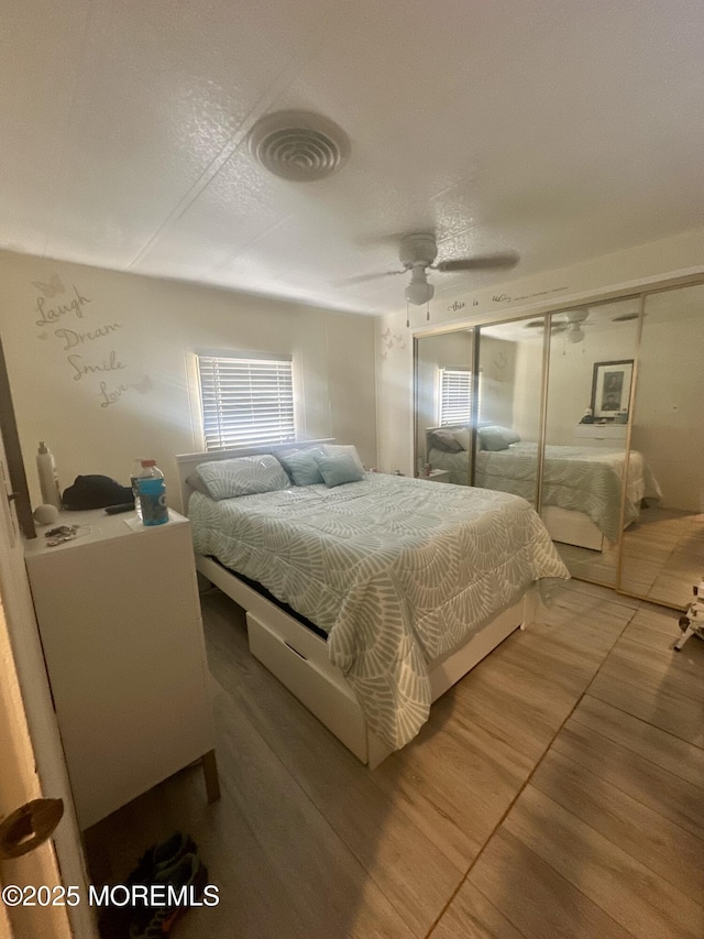 1006 Nocturn Way, Toms River, NJ 08755 - bedroom featuring wood finished floors, multiple windows, and ceiling fan