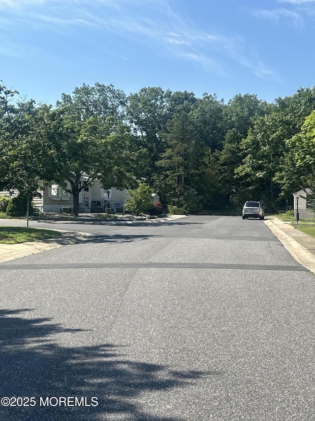 1006 Nocturn Way, Toms River, NJ 08755 - view of asphalt street with curbs and sidewalks