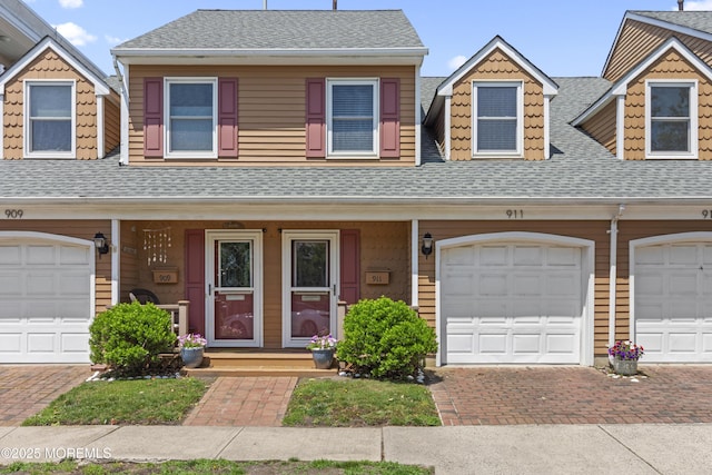 911 Beach Ave, Bradley Beach, NJ 07720 - multi unit property with roof with shingles, a porch, and driveway