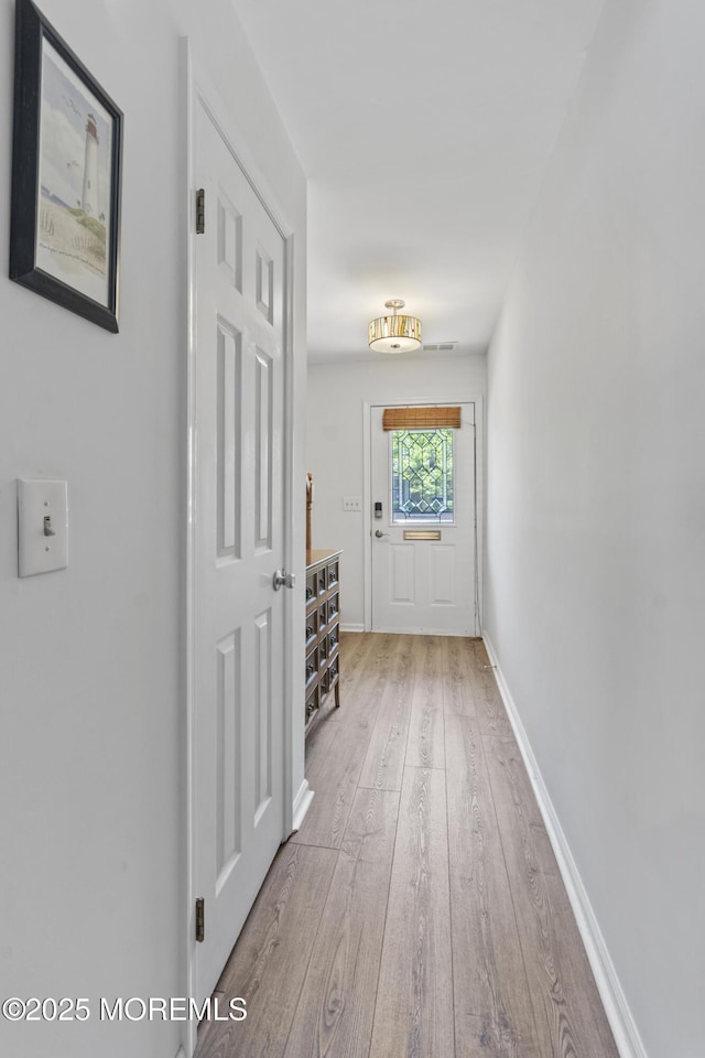 911 Beach Ave, Bradley Beach, NJ 07720 - hall featuring hardwood / wood-style floors and baseboards
