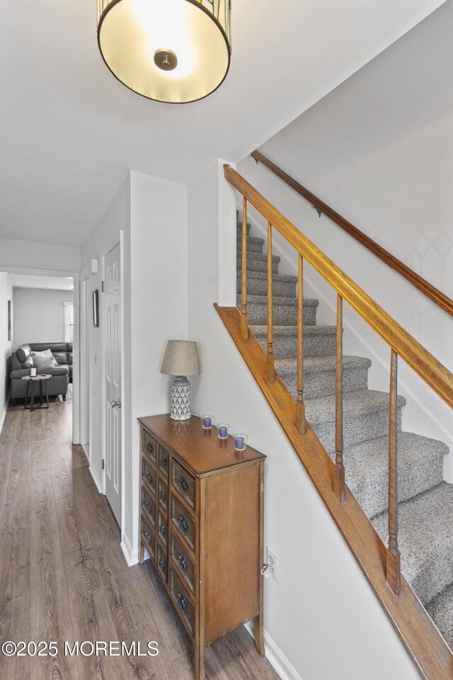 911 Beach Ave, Bradley Beach, NJ 07720 - stairs with wood finished floors and baseboards