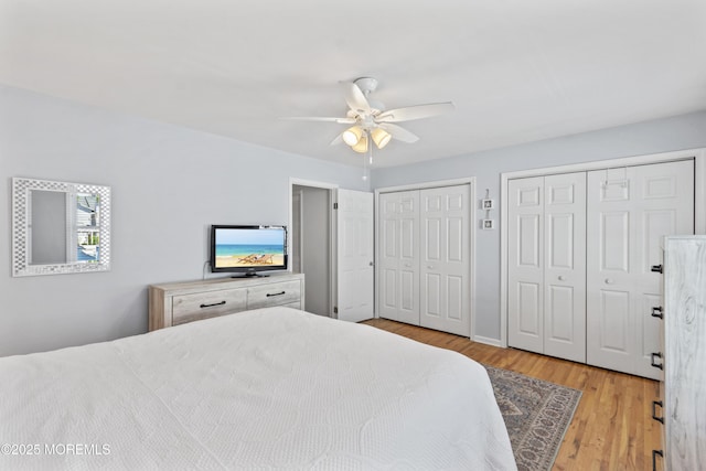 911 Beach Ave, Bradley Beach, NJ 07720 - bedroom featuring multiple closets, wood finished floors, and ceiling fan