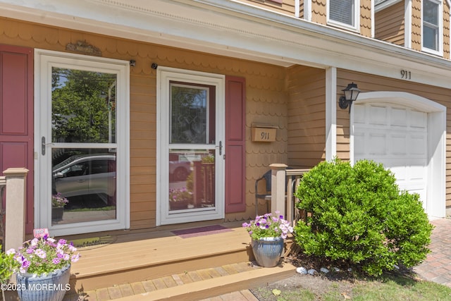911 Beach Ave, Bradley Beach, NJ 07720 - entrance to property featuring a porch and a garage