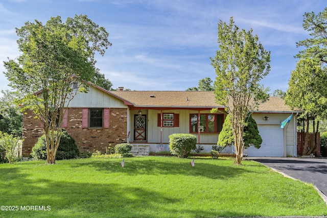 2238 Emerald Park Dr, Forked River, NJ 08731 - ranch-style home featuring board and batten siding, a garage, a front lawn, driveway, and brick siding