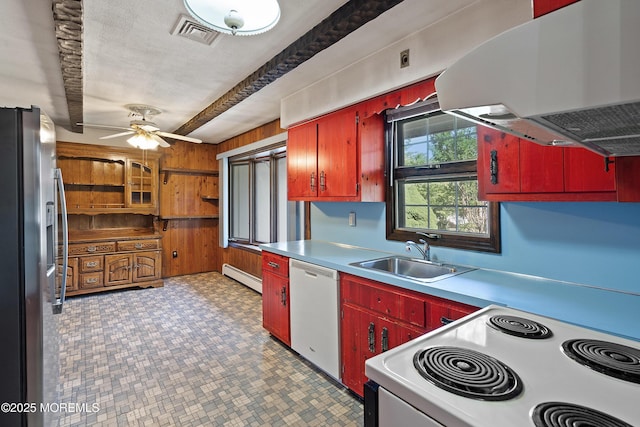 2238 Emerald Park Dr, Forked River, NJ 08731 - kitchen with white appliances, range hood, a baseboard heating unit, red cabinetry, and a ceiling fan