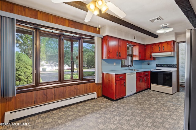 2238 Emerald Park Dr, Forked River, NJ 08731 - kitchen featuring white appliances, baseboard heating, under cabinet range hood, light countertops, and wood walls