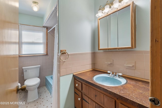 2238 Emerald Park Dr, Forked River, NJ 08731 - bathroom with tile walls, vanity, tile patterned flooring, shower / bath combination, and a wainscoted wall
