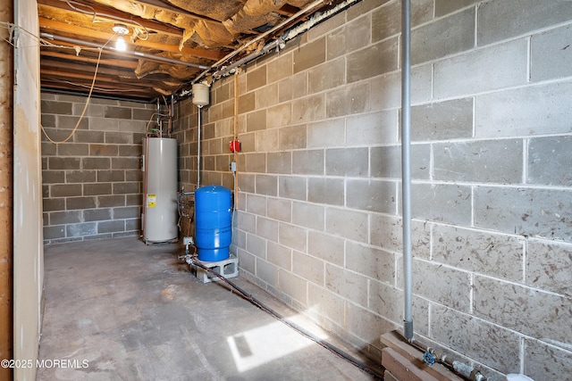 2238 Emerald Park Dr, Forked River, NJ 08731 - unfinished basement with gas water heater, a water pressure tank, and concrete block wall