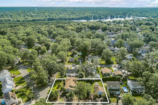 2238 Emerald Park Dr, Forked River, NJ 08731 - aerial perspective of suburban area with property boundaries highlighted and a large body of water