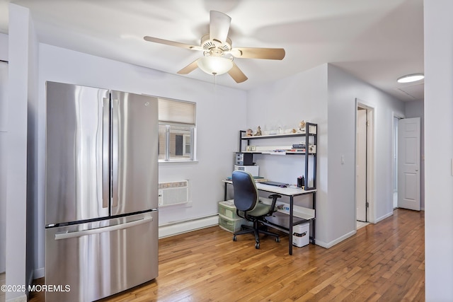 51 Berkshire Ct, Toms River, NJ 08753 - office space featuring baseboard heating, light wood-type flooring, a ceiling fan, and a wall mounted air conditioner
