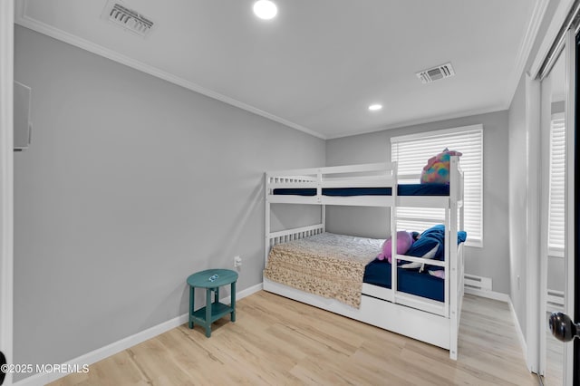 8 Navarra Dr, Brick, NJ 08723 - bedroom featuring crown molding, wood finished floors, recessed lighting, and a baseboard radiator