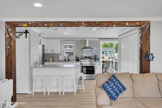 8 Navarra Dr, Brick, NJ 08723 - living room with light wood-type flooring, ornamental molding, and recessed lighting