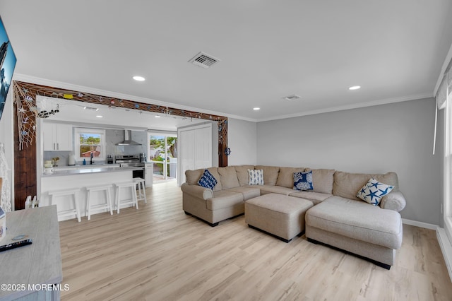 8 Navarra Dr, Brick, NJ 08723 - living area with light wood-style flooring, ornamental molding, and recessed lighting