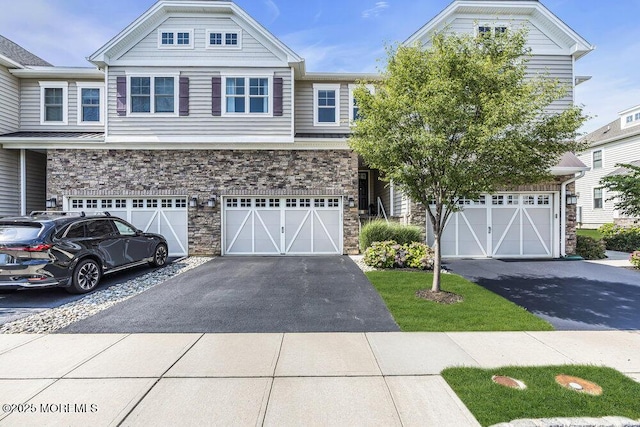 30 Malcolm Way, Lincroft, NJ 07738 - view of front facade with stone siding, driveway, and a garage